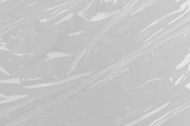 Beyaz plastik veya polietilen çanta dokusu, Şeffaf kırışık plastik, makro, beyaz arkaplan