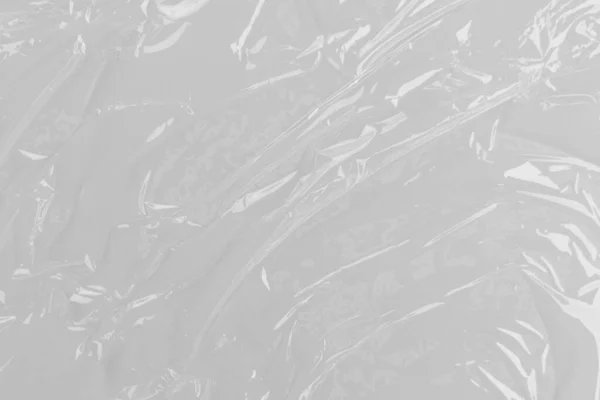 Beyaz plastik veya polietilen çanta dokusu, Şeffaf kırışık plastik, makro, beyaz arkaplan