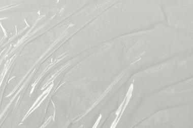 Beyaz arka planda plastik şeffaf selofan çanta. Beyaz plastik film ambalajlı arka plan. Beyaz Plastik Torba Dokusu