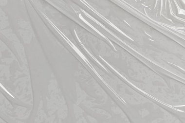 Beyaz arka planda plastik şeffaf selofan çanta. Beyaz plastik film ambalajlı arka plan. Beyaz Plastik Torba Dokusu