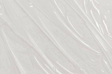 Beyaz arka planda plastik şeffaf selofan çanta. Beyaz plastik film ambalajlı arka plan. Beyaz Plastik Torba Dokusu