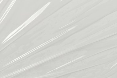 Beyaz arka planda plastik şeffaf selofan çanta. Beyaz plastik film ambalajlı arka plan. Beyaz Plastik Torba Dokusu