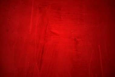 Kırmızı duvar dokusu arka plan. Arka plan için korkunç kırmızı duvar, eski püskü kan boyası ve alçı çatlakları..