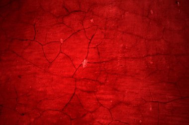 Kırmızı duvar dokusu arka plan. Arka plan için korkunç kırmızı duvar, eski püskü kan boyası ve alçı çatlakları..