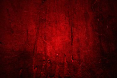 Kırmızı duvar dokusu arka plan. Arka plan için korkunç kırmızı duvar, eski püskü kan boyası ve alçı çatlakları..
