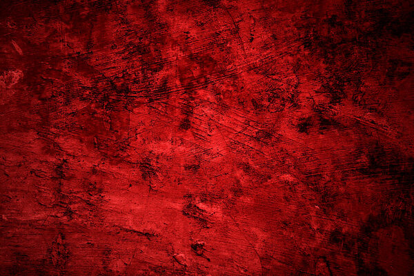 Красная стена текстуры фона. страшная красная стена на заднем плане, старая потрепанная кровавая краска и гипсовые трещины.