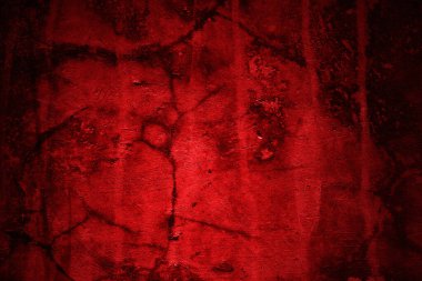 Kırmızı duvar dokusu arka plan. Arka plan için korkunç kırmızı duvar, eski püskü kan boyası ve alçı çatlakları..