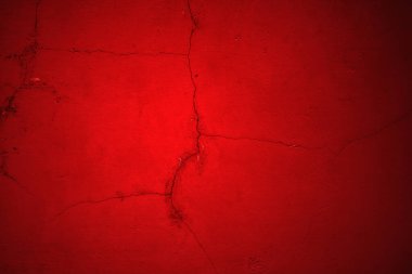 Kırmızı duvar dokusu arka plan. Arka plan için korkunç kırmızı duvar, eski püskü kan boyası ve alçı çatlakları..