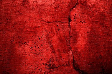 Kırmızı duvar dokusu arka plan. Arka plan için korkunç kırmızı duvar, eski püskü kan boyası ve alçı çatlakları..
