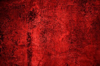 Kırmızı duvar dokusu arka plan. Arka plan için korkunç kırmızı duvar, eski püskü kan boyası ve alçı çatlakları..