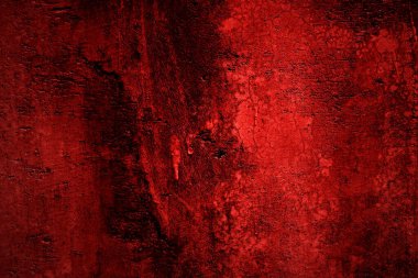 Kırmızı duvar dokusu arka plan. Arka plan için korkunç kırmızı duvar, eski püskü kan boyası ve alçı çatlakları..