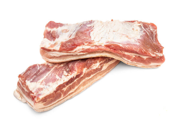 Two piece of raw pork brisket on white background. Raw meat. Top view.