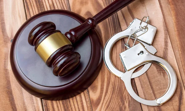 Judge Gavel Handcuffs Table Top View Crime Law Concept Stock Photo