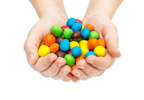 Child Holding Many Colorful Candies Her Palms Isolated White — Stock Photo, Image