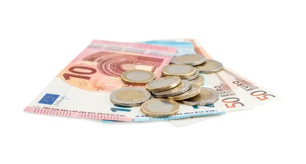 Monedas Euros Con Billetes Euros Sobre Fondo Blanco Concepto Empresarial Imágenes de stock libres de derechos