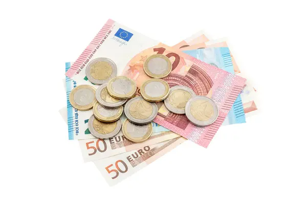 Monedas Euros Con Billetes Euros Sobre Fondo Blanco Concepto Empresarial Imágenes de stock libres de derechos