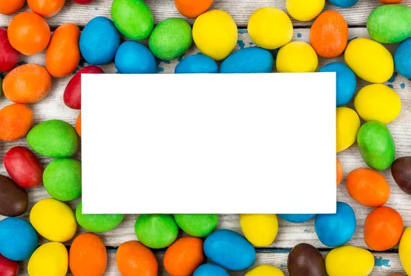 Empty White Card Colorful Candies Table Top View Royalty Free Stock Photos