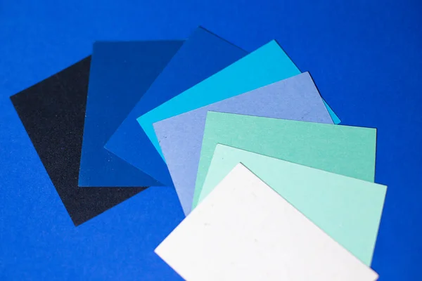 Designer paper, on a blue background, a palette of colors, a beautiful combination