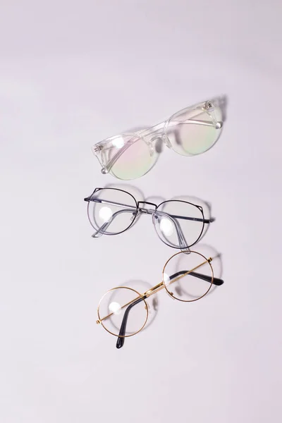 Különböző Szemüveg Egy Gyönyörű Fény Háttér — Stock Fotó