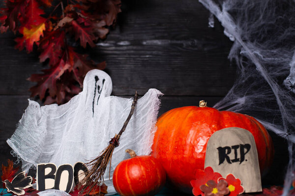 Fresh pumpkin with festive decorations for Halloween