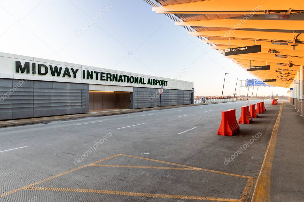 Chicago, IL, USA - December 9, 2020: The exterior of the Midway International Airport sign at the departures during sunset.