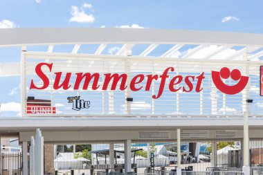 Milwaukee, WI, USA - August 12, 2024: The entrance to Summerfest in downtown Milwaukee. Summerfest is an annual multi-day music festival located at Henry Maier Festival Park on the lakefront. clipart