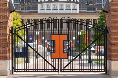 Champaign, IL, USA - August 18, 2024: University of Illinois Memorial Stadium is home to the NCAA Fighting Illini football team. The stadium was built in 1923 with a capacity of over 60,000 people. clipart