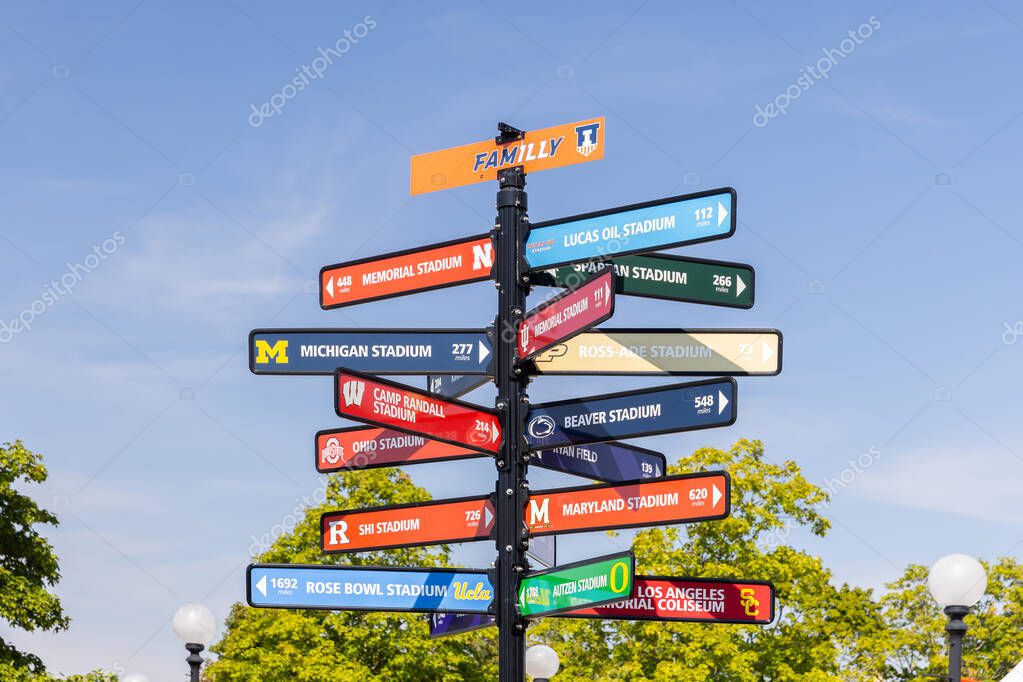 Champaign, IL, USA - August 18, 2024: Directions to NCAA college football stadiums outside of the Memorial Stadium at the University of Illinois.