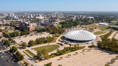 Champaign, IL, USA - September 18, 2024: State Farm Center is an arena at the University of Illinis hosting the Fighting Illini basketball teams and wrestling, as well as concerts and other events. clipart