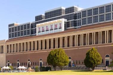 Champaign, IL, USA - August 18, 2024: University of Illinois Memorial Stadium is home to the NCAA Fighting Illini football team. The stadium was built in 1923 with a capacity of over 60,000 people. clipart