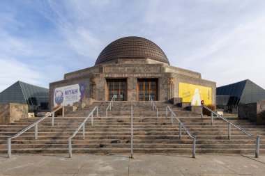 Chicago, IL, USA - December 17, 2024: The Adler Planetarium is located on the Museum Campus in downtown Chicago and the first Planetarium in America. clipart