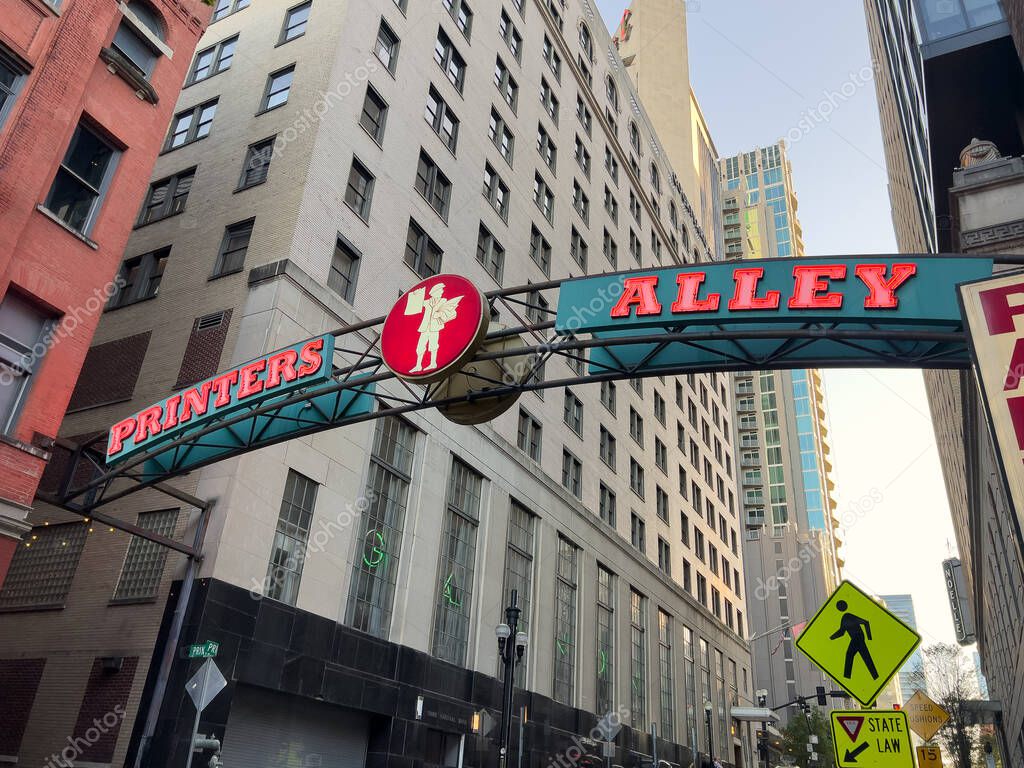 Nashville, TN, USA - April 15, 2025: Printers Alley is a small, historic entertainment district in downtown Nashville featuring nightclubs, bars, and live music.