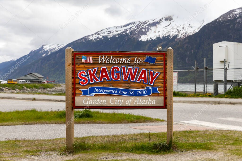 Skagway, AK, USA - June 2, 2025: The Welcome to Skagway sign as guests are entering the city. This is a popular cruise port for guests doing an Alaskan cruise.