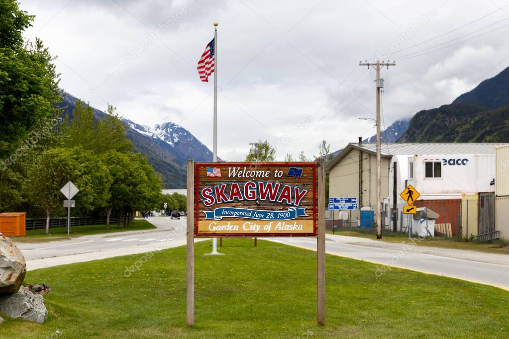 Skagway, AK, USA - June 2, 2025: The Welcome to Skagway sign as guests are entering the city. This is a popular cruise port for guests doing an Alaskan cruise.