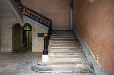 Nimes, Occitanie, France, 12 31 2022 - Staircase and colorful wall of the city hall