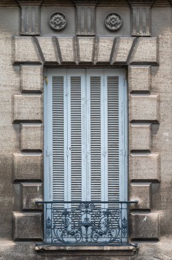 Avignon, Vaucluse, France, 12 29 2022 - Closed shutter of a window with antique decorations