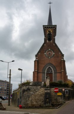 Borcht, Flemish Brabant Region -  Belgium - Feb. 19 2023 - The small church and market place of the village