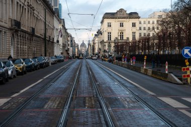 Brussels city center, Brussels Capital Region, Belgium - Jan. 19 2023 - The Rue Royale, King Street with tramway tracks and historical buildings