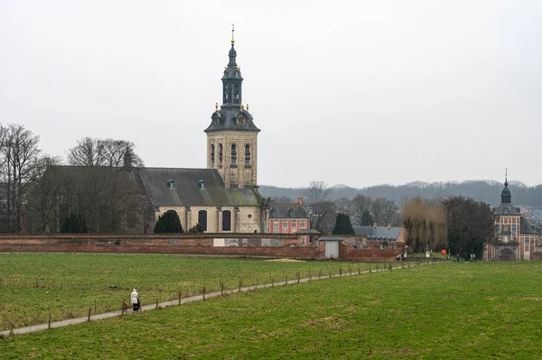 stock image Kessel-Lo, Flemish Brabant, Belgium - Feb 11 2023 - The Park abbey tower and green surroundings around the railway station