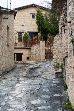 Lofou, Limassol District, Cyprus, March 24, 2023 - Traditional narrow alley in the village clipart