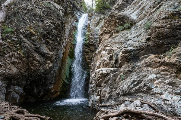 stock image The Millomeris waterfall with rocks and splashing water, Pano Platres, Cyprus