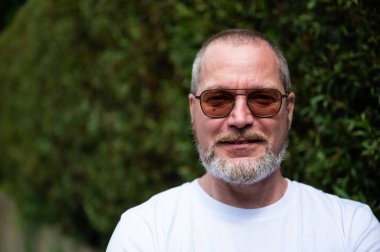 Casual portrait of a 48 yo white man wearing glasses, Borchtlombeek, Flanders, Belgium. Model released clipart