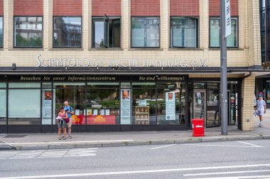 Hamburg, Germany, July 18, 2024 - The Scientology church with tourists clipart