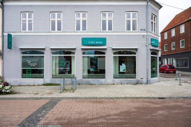 Vordingsborg, Seeland, Denmark, July 22, 2024 - Facade of a local agency of the Jyske Bank clipart