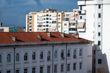 University building and colorful apartment blocks, high angle view of Tirana, Albania, DEC 7, 2024 clipart