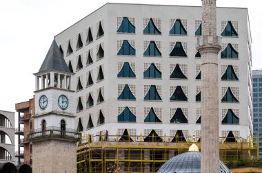 Minaret of the Et'hem bey mosque and the clock tower of Tirana, Albania, DEC 7, 2024 clipart