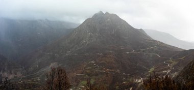 Kruja Mountains rough nature landscape with dark clouds near Kruje, Durres County, Albania clipart