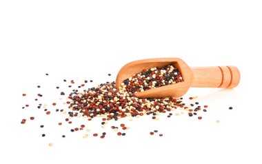 Pile of mixed raw quinoa in wooden scoop isolated on white background clipart