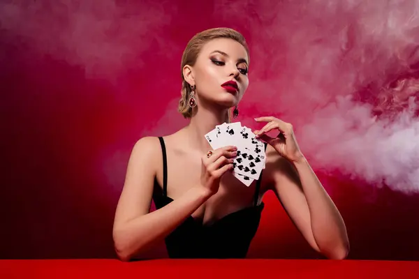 Photo of elegant rich lady dressed sexy outfit enjoying poker game isolated red maroon color background.
