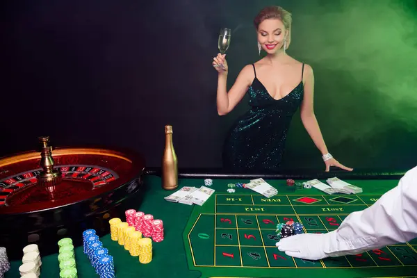 Photo of stunning chic lady celebrate christmas holiday in vip casino club playing poker.